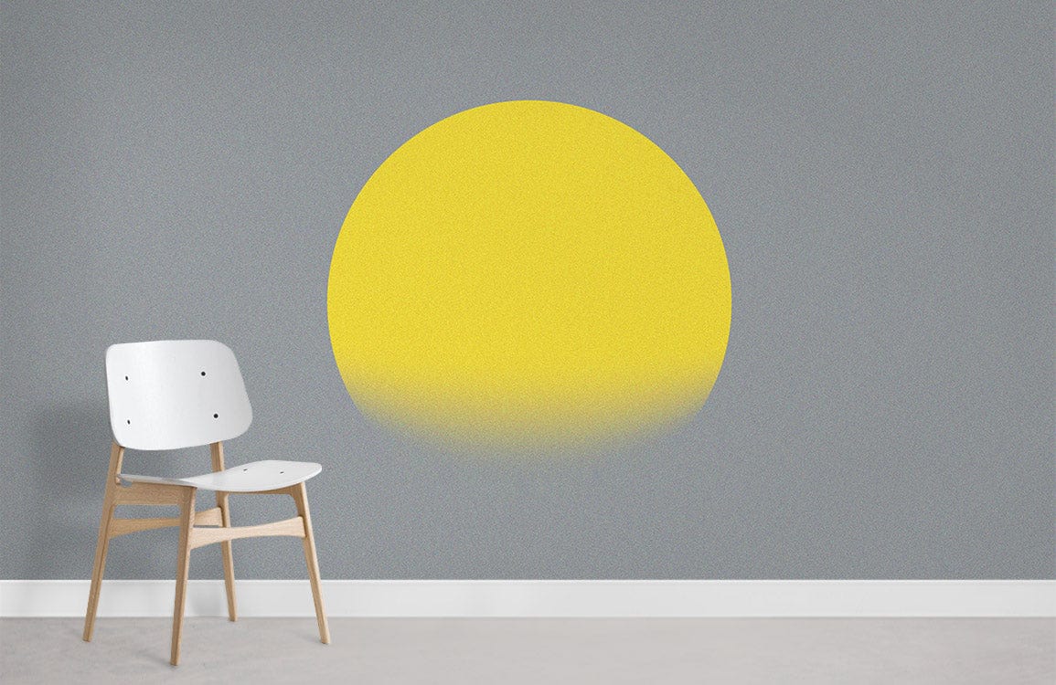 Elegant Yellow Sunrise mural wallpaper on minimalist grey wall, with modern white chair, light flooring.