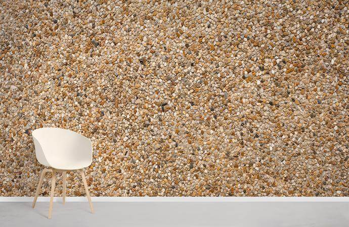 Natural pebble texture beige wallpaper with white chair; rustic interior wall Décor setting.