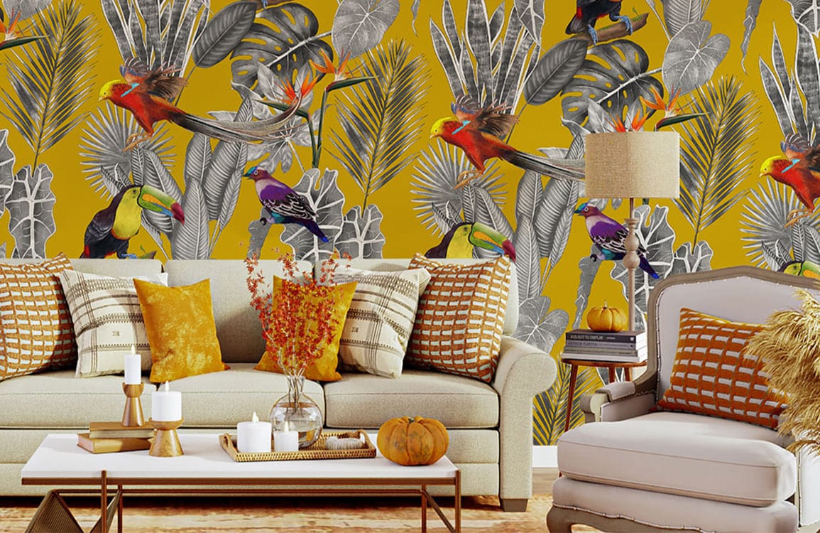 Tropical toucan wallpaper in vibrant yellow room, beige sofa with cushions, and modern table lamp.