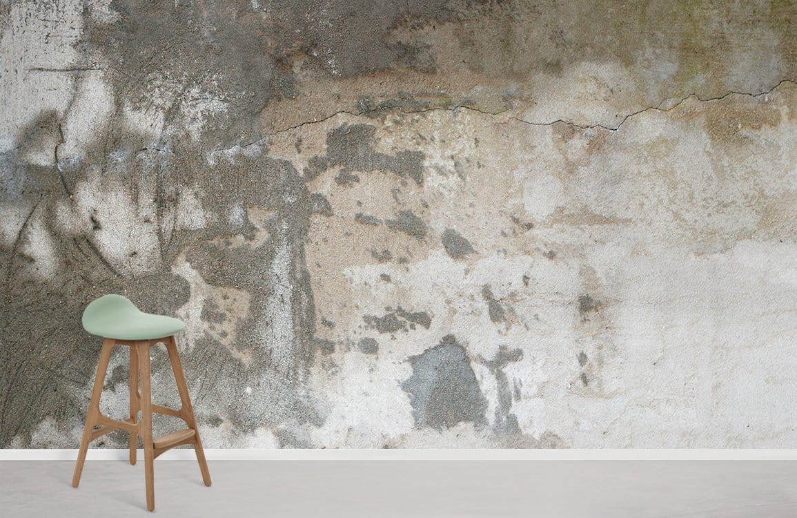 Vintage industrial mural wallpaper with neutral earth-tones, styled with wooden stool, concrete-style flooring.